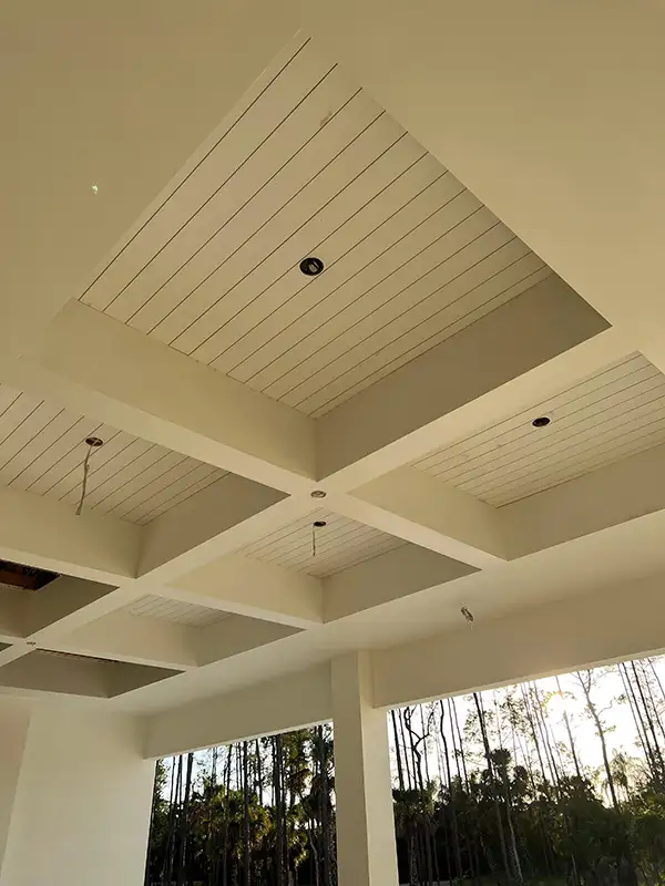 Tongue and groove porch ceiling with beams