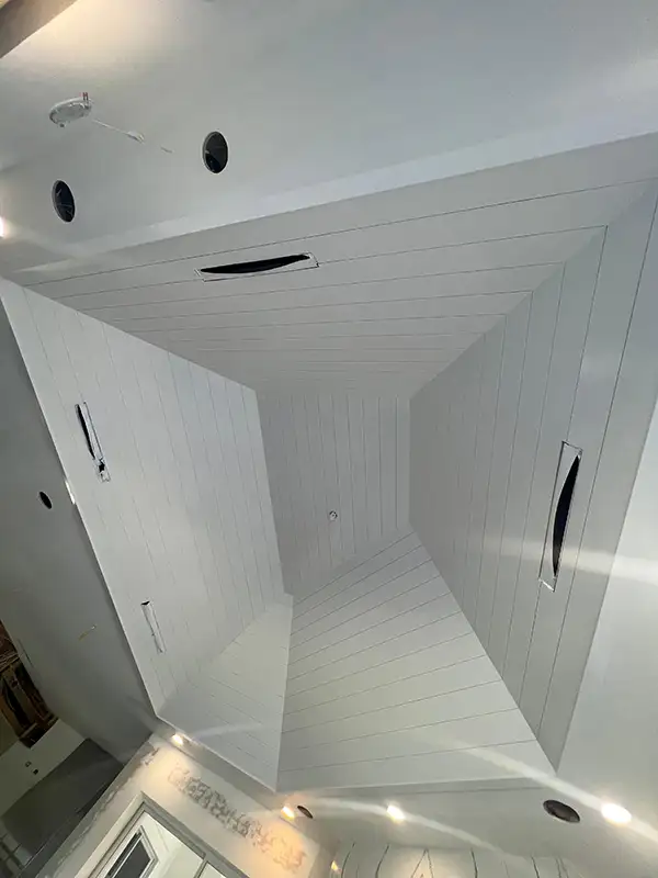White shiplap ceiling and walls