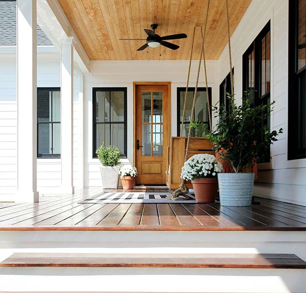 Porch with plank ceiling and wood finishes